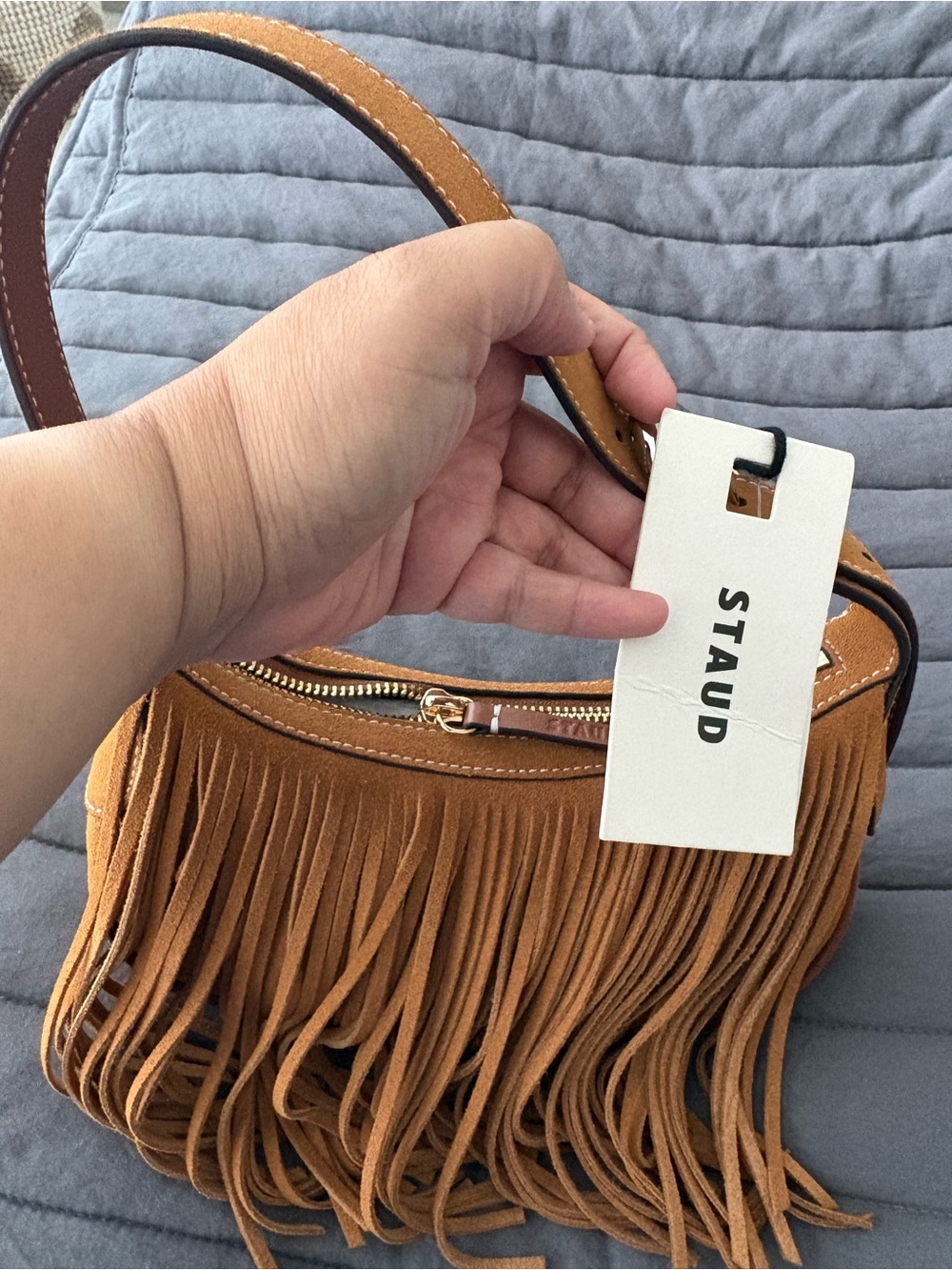 STAUD Suede Crescent Shoulder Bag in Cognac Brown with Tassel